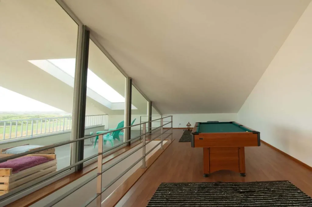 Lounge area with a billiard table.