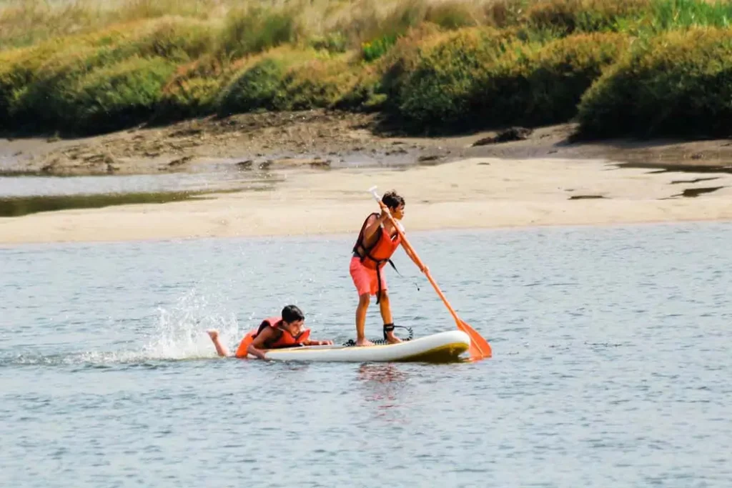 Surf Clinic kids Stand Up Paddle lesson.
